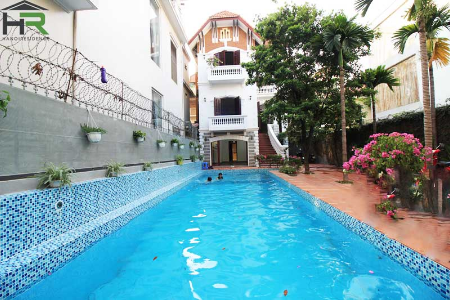 Newly Swimming pool villa for rent in To Ngoc Van with four beds, large yard