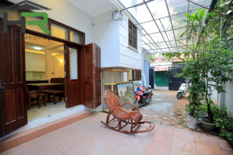 A charming 4floor house with an Elegant Style and a Big Yard for rent in Xuan Dieu st 